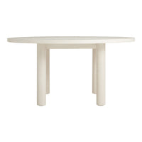 Round white dining table with a smooth finish and minimalist design, featuring simple cylindrical legs.