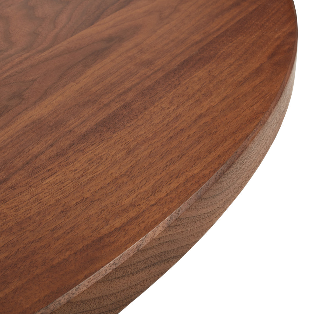 Close-up of a rich walnut wood surface featuring warm brown tones and subtle grain patterns. Ideal for natural decor.