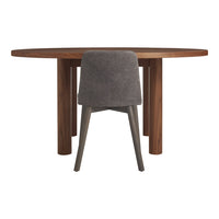 Round wooden dining table with a rich brown finish and a sleek grey upholstered chair. Modern and stylish design.