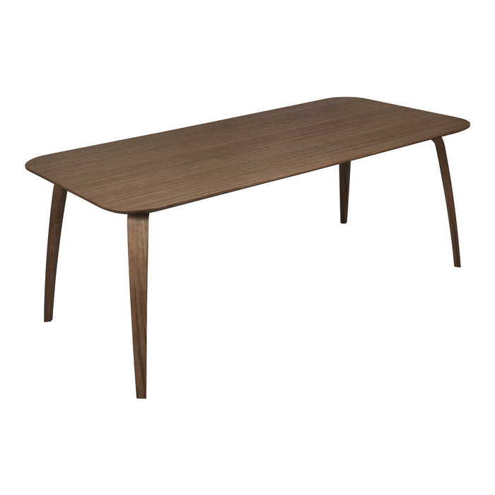 Walnut brown rectangular dining table with smooth surface and sleek tapered legs. Modern design complements various decor styles.