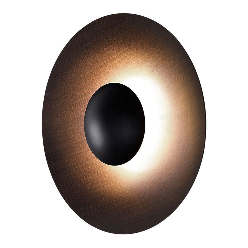Modern oval wall light with a sleek bronze finish, black center, and warm LED glow, perfect for contemporary decor.