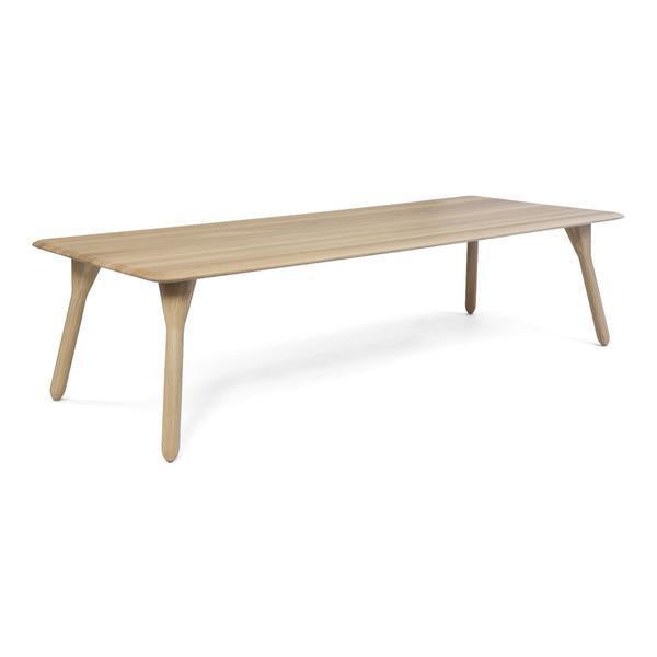 Natural oak wood dining table with a sleek, minimalistic design and smooth, light brown surface. Perfect for any decor.
