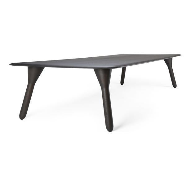 Sleek black rectangular table with smooth surface and elegant tapered legs, perfect for modern decor.