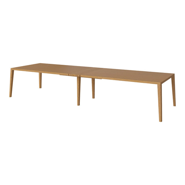 Light oak wood rectangular table with smooth surface and minimalist design, featuring natural wood grain pattern.