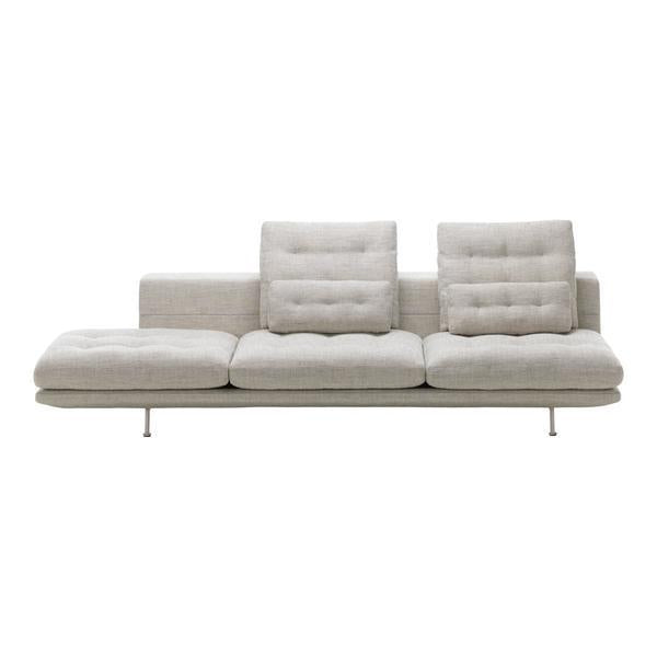 Light gray modular sofa with button-tufted cushions and a sleek, minimal design. Perfect for modern living spaces.