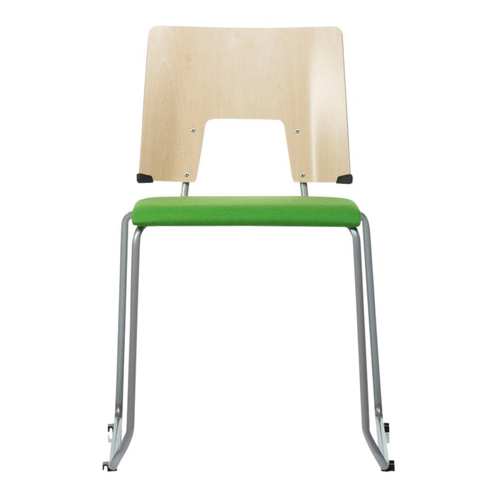Modern chair with a light wood backrest and bright green cushioned seat, featuring a sleek metal frame.