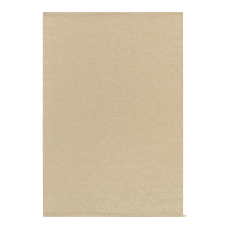 Beige textured fabric with a smooth finish, perfect for upholstery or home decor projects.