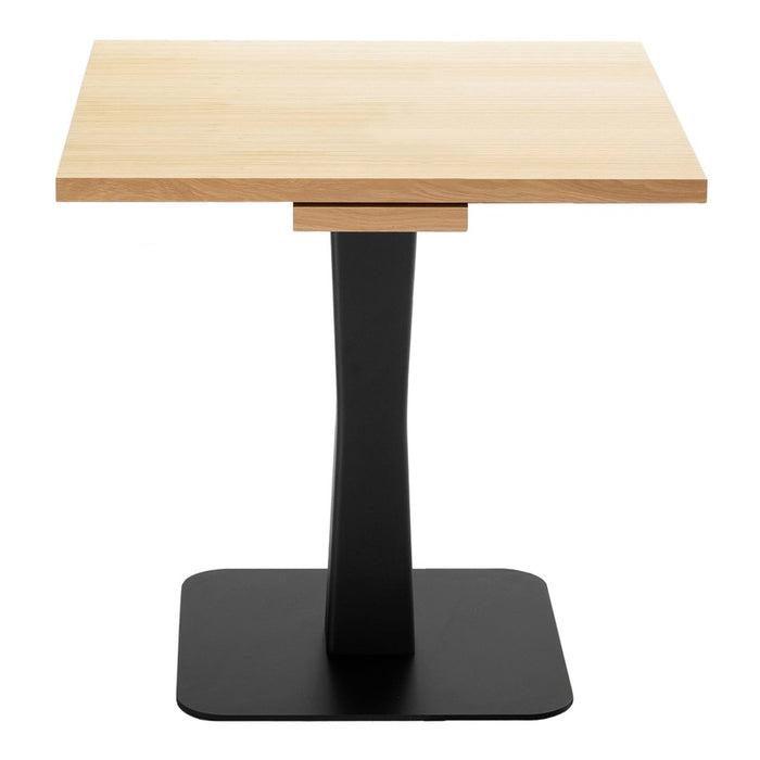 Light wood tabletop with a smooth finish, paired with a sleek black base for a modern contrast.