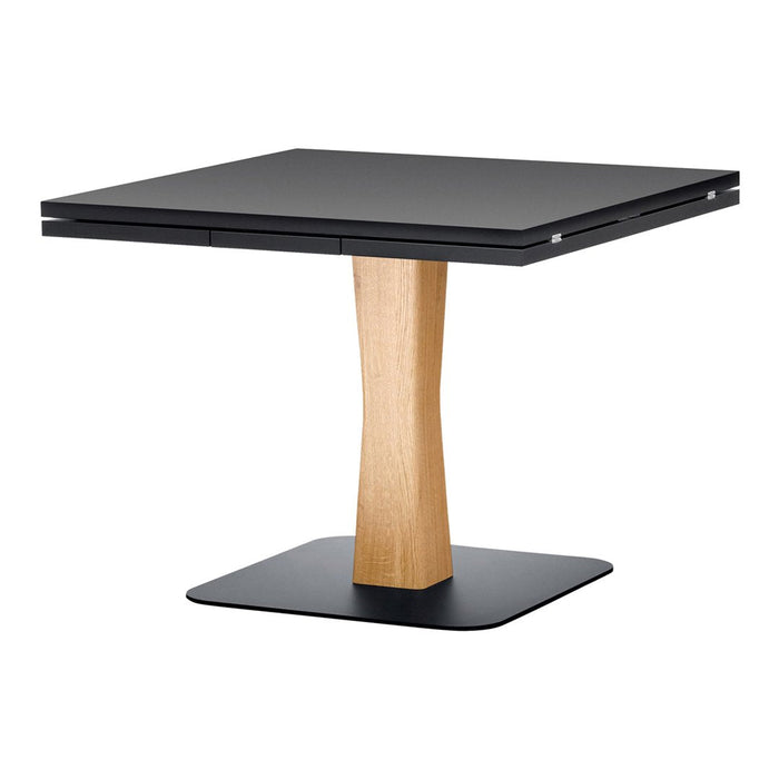 Black square tabletop with a sleek wood base in natural finish, combining modern and warm tones. Ideal for contemporary spaces.