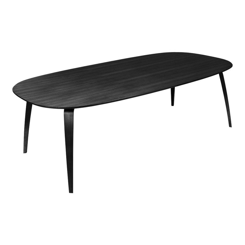 Sleek black oval dining table with smooth, matte finish and slender legs for a modern aesthetic.