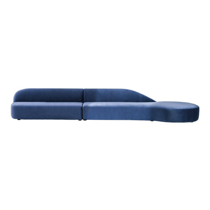 Modern blue sectional sofa with smooth, clean lines and a sleek silhouette, perfect for contemporary interiors.