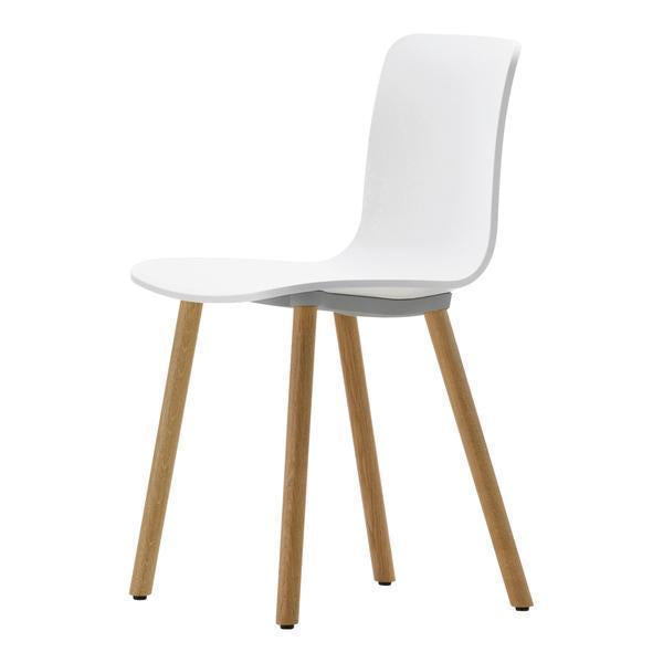 White minimalist chair with natural wood legs, perfect for modern decor. Simple and stylish design.