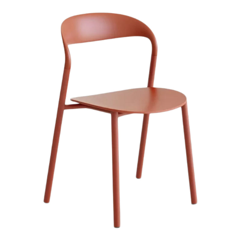 Terracotta dining chair with a smooth, minimalist design and curved backrest, perfect for contemporary spaces.
