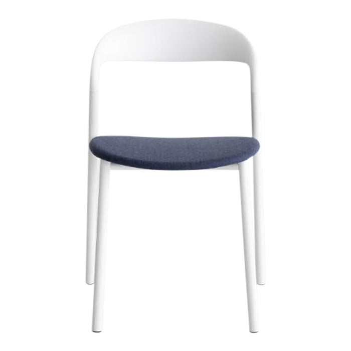 White chair with a solid design and a dark blue upholstered seat. Modern, minimalistic color combination.