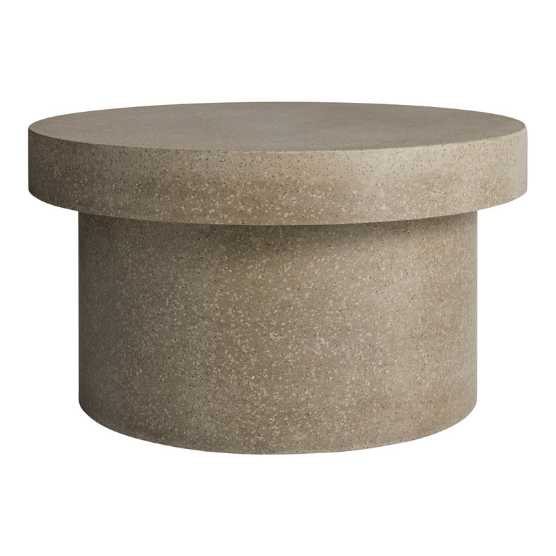 Round beige stone coffee table with a smooth, matte finish and subtle texture patterns. Perfect for modern decor.