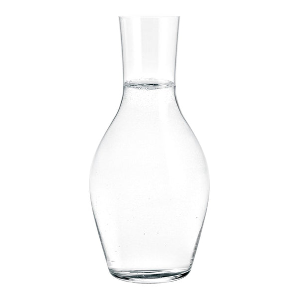 Clear glass water carafe with a smooth, elegant shape and no patterns. Perfect for any table setting. 