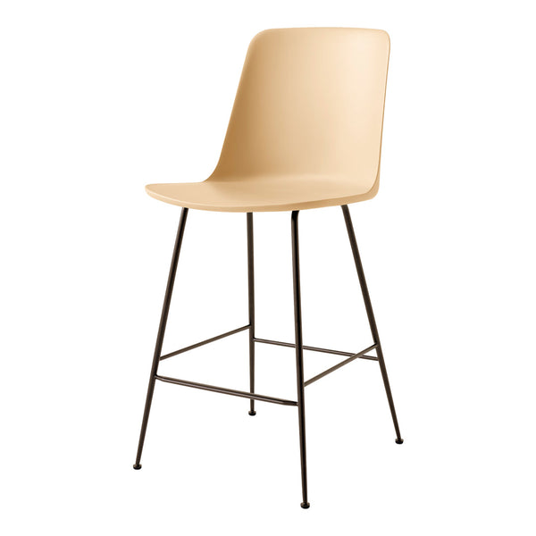 Beige molded chair with simple lines and black metal legs, perfect for modern decor.