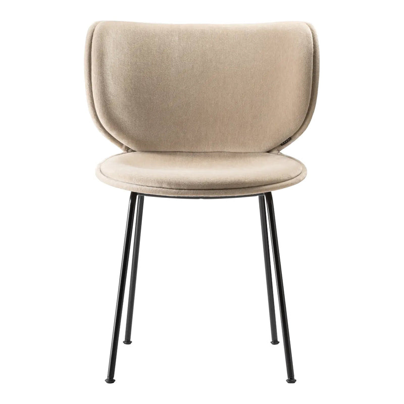 Beige upholstered chair with smooth, rounded lines and black metal legs, offering a modern, minimalist design.