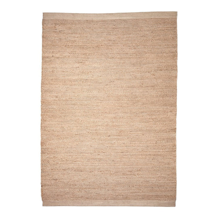 Light beige woven area rug with subtle texture, perfect for minimalistic décor and neutral color schemes.