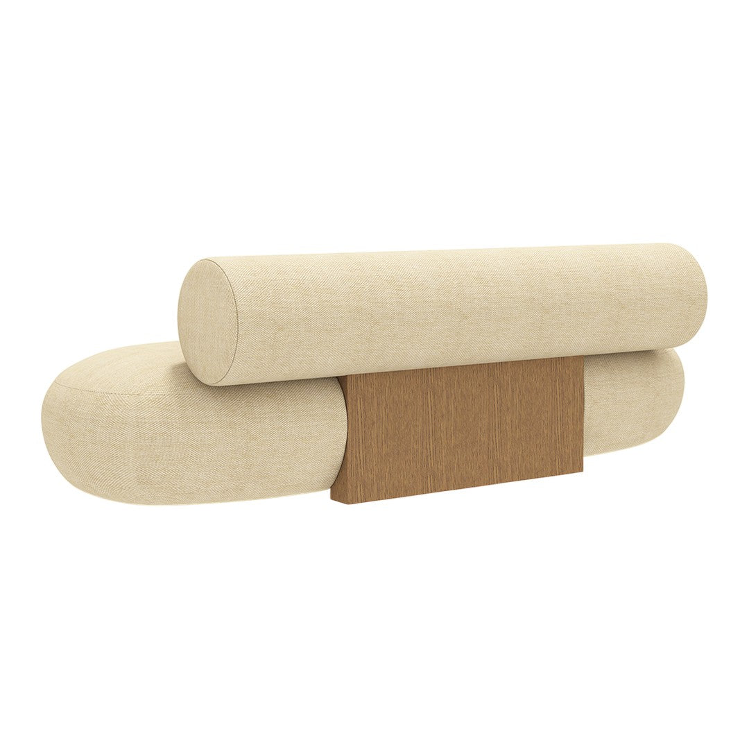 Beige plush couch with rounded shapes and a natural wood accent, creating a soft, minimalistic aesthetic.