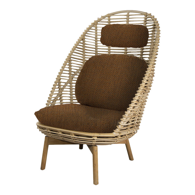 Boho-style rattan chair with a natural wicker frame and rich brown cushions, featuring a sleek, modern design.