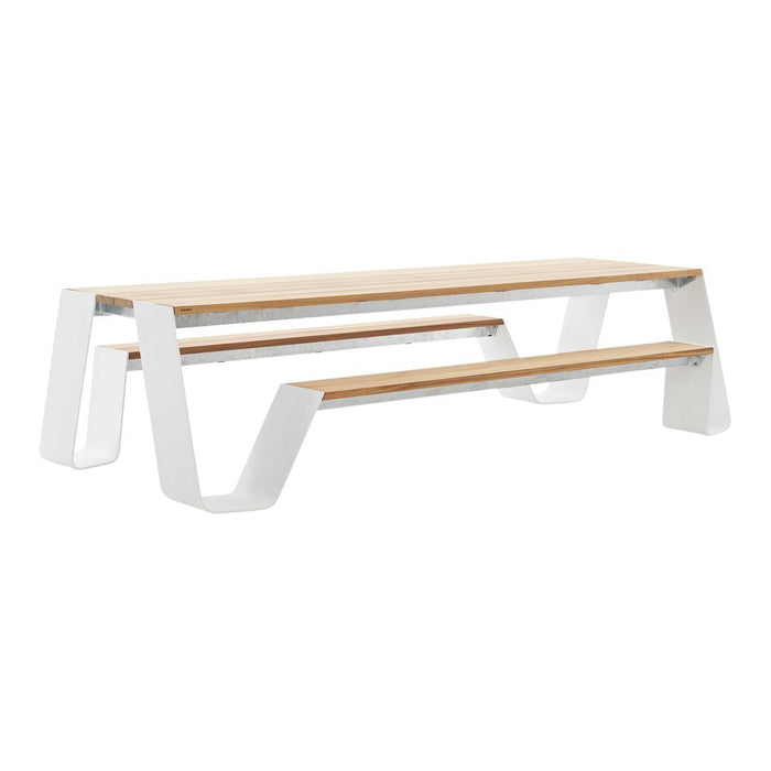 Modern picnic table with a natural wooden top and sleek white legs, featuring a minimalist design and angular patterns.