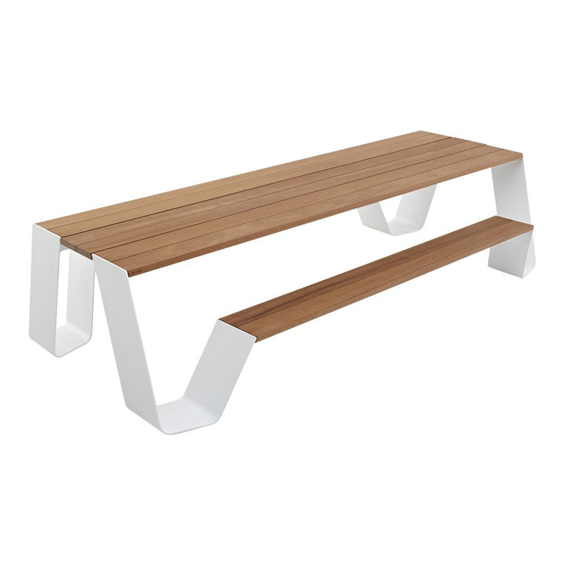 Modern wooden table with a light brown finish and sleek white geometric legs, showcasing a minimalist design.