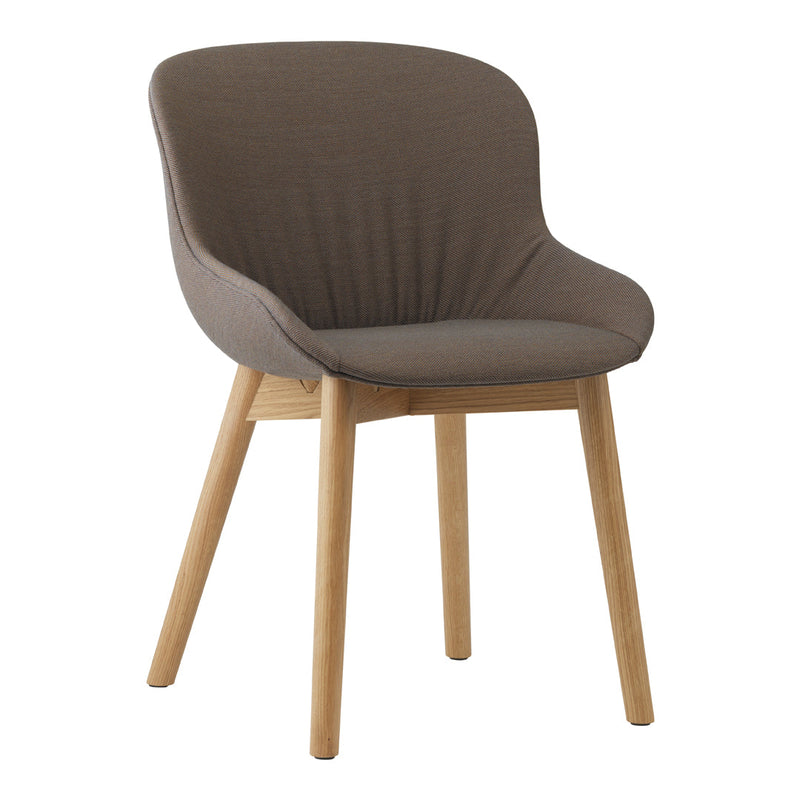 Brown upholstered chair with a textured fabric and natural wood legs, creating a modern and cozy look.