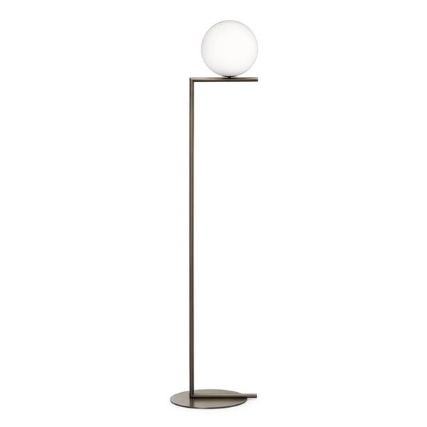 Sleek black floor lamp with a round white glass shade and minimalistic design, perfect for modern decor.