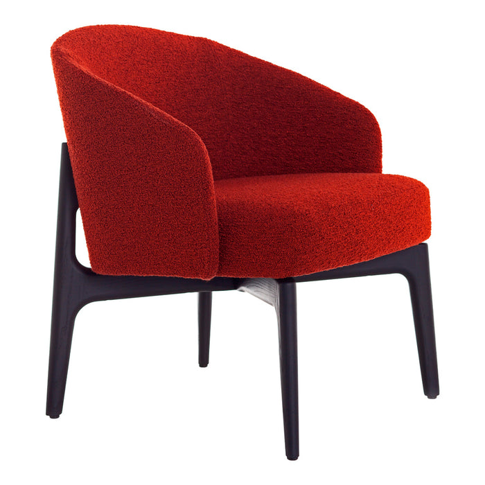 Vibrant red upholstered chair with a plush texture and sleek black legs, perfect for modern decor.