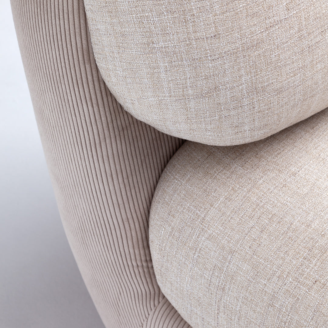 Light beige textured fabric with subtle ribbed and woven patterns, perfect for modern home decor.