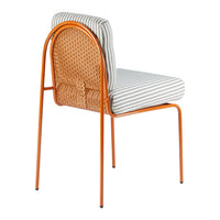 Orange metal chair with a striped white and gray cushion and a woven backrest design. Ideal for stylish outdoor seating.