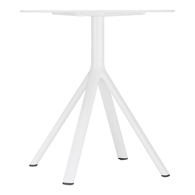 White modern table with a sleek, minimalistic design and four tapered legs, perfect for contemporary spaces.