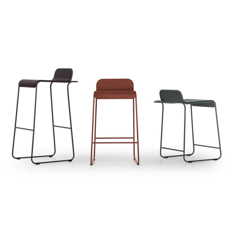 Set of three modern bar stools in dark brown, rust orange, and muted green with sleek, minimalist designs.