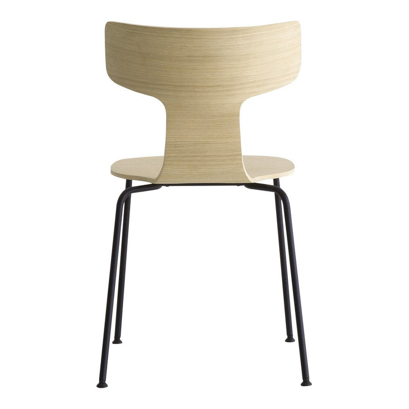 Light wood chair with a natural finish and sleek black metal legs for a modern touch.