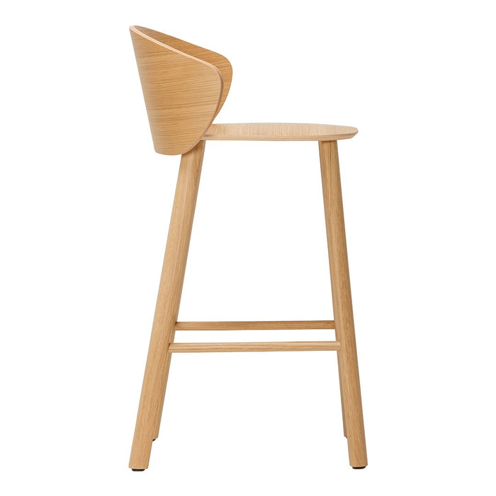 Coral pink upholstered seat with a rust-colored frame and gold accents, showcasing a textured, modern design.