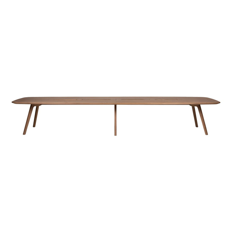 Long, minimalist coffee table in warm brown wood with smooth surface and tapered legs, perfect for modern decor.