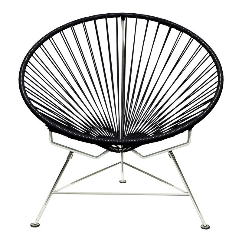 Black wire chair with a circular, radiating pattern on a sleek silver frame. Modern design for stylish interiors.
