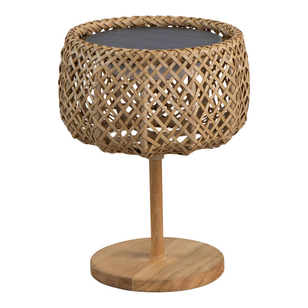 Woven rattan table in natural brown with a dark circular top; textured, organic pattern.
