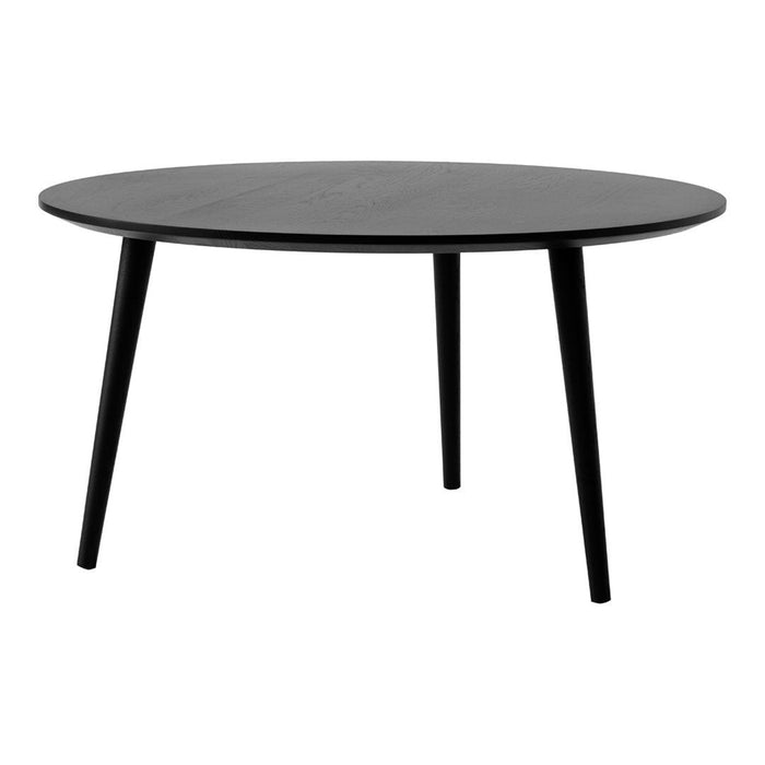 Round black coffee table with sleek black legs and a smooth surface, perfect for modern interiors.