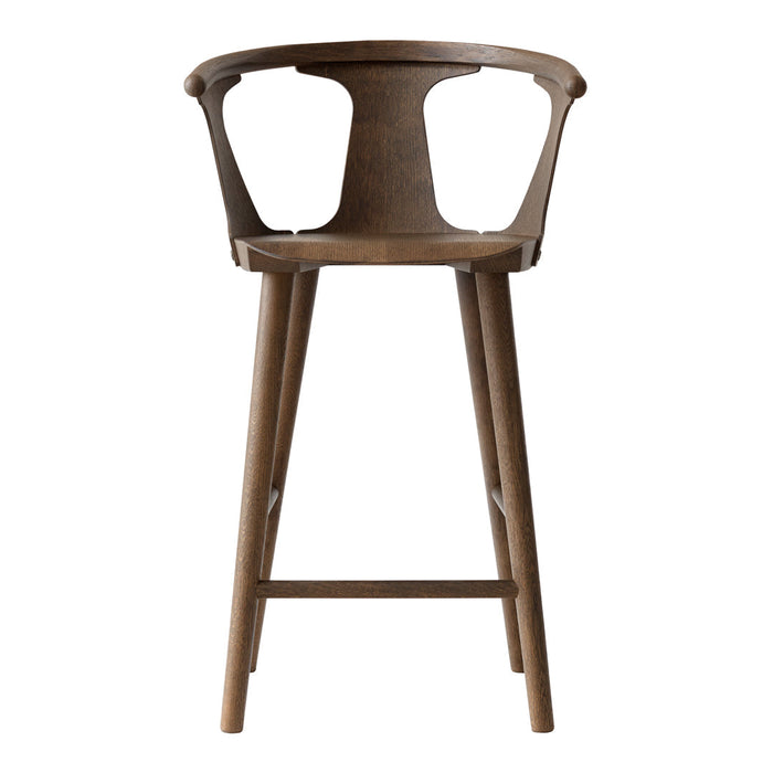 Wooden bar stool with a warm walnut finish, showcasing a smooth, natural grain pattern for a rustic touch.