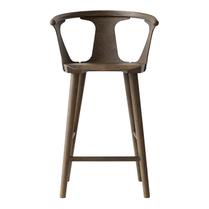 "Stylish wooden bar stool in a rich brown finish with a sleek, modern design."
