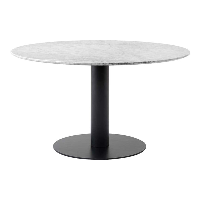 Round marble dining table with a sleek black pedestal base, featuring a smooth, polished surface and elegant patterns.