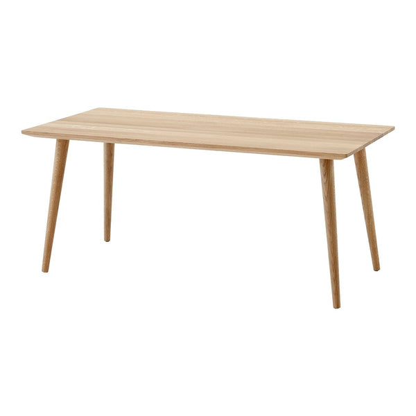 Light wood dining table with natural grain, featuring a sleek, minimalist design and tapered legs.