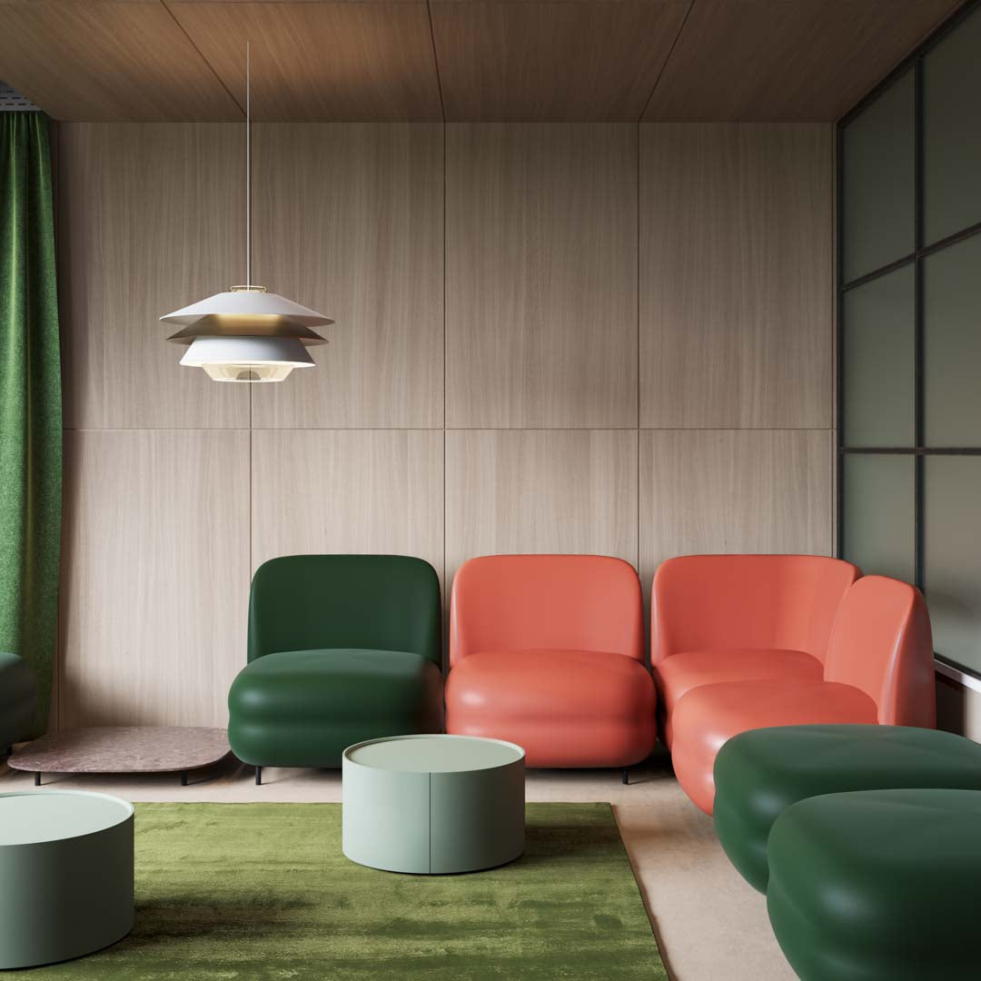 Colorful modern seating in green, orange, and mint accents, paired with a soft green area rug in a sleek interior.