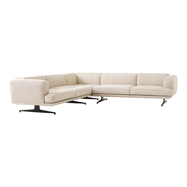 Modern beige sectional sofa with clean lines and soft upholstery, perfect for contemporary living spaces.