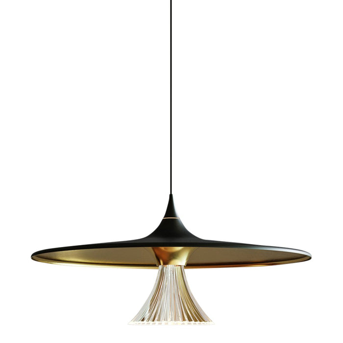 Sleek black and gold pendant lamp with a unique flared design and white fringed accent. Perfect for modern decor.