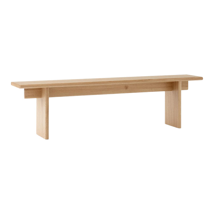 Light natural wood bench with a smooth finish and minimalist design, showcasing a simple and elegant pattern.