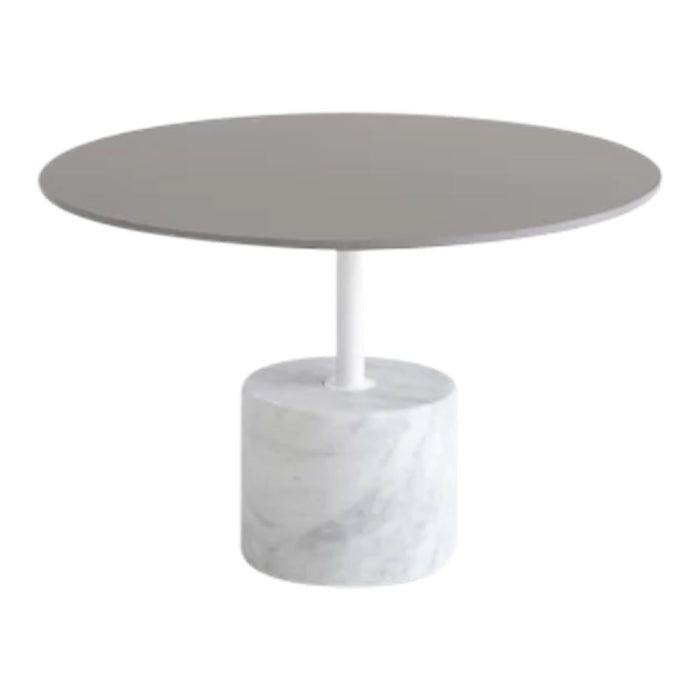 Round gray tabletop with a sleek white marble base, featuring a smooth, minimalist design and subtle textures.