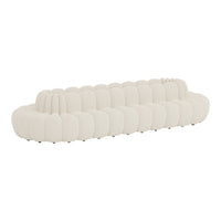Soft white sofa with a plush, rounded design and subtle textured grooves for a contemporary look.
